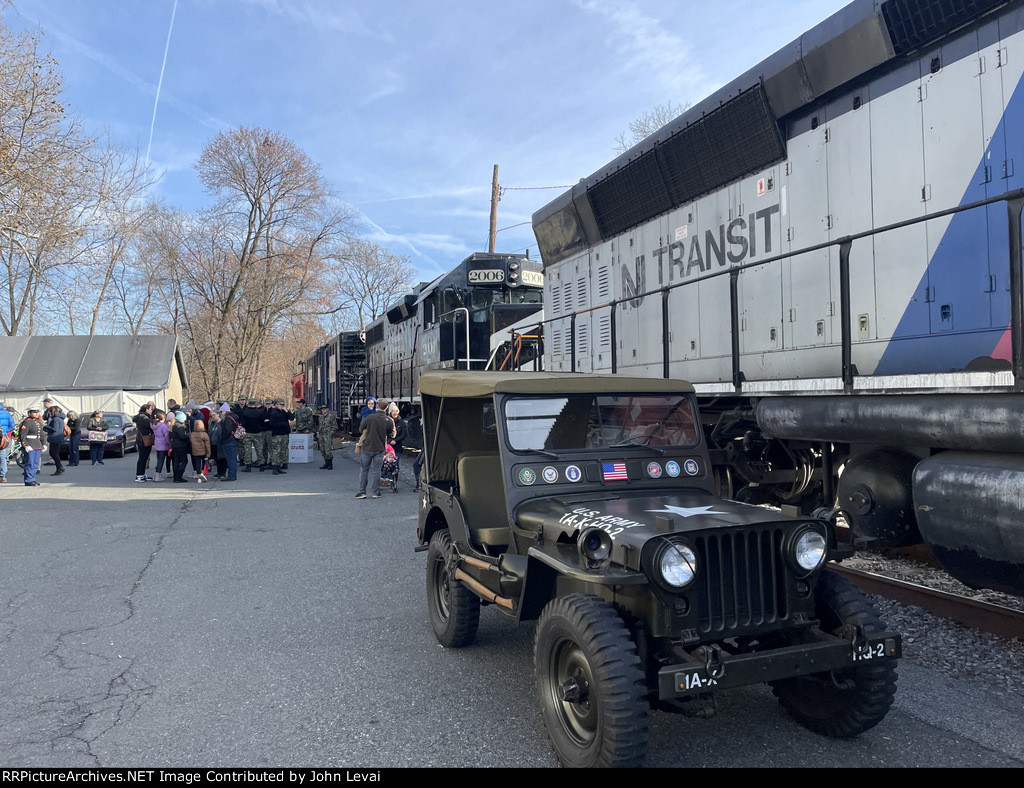 A nice sized crowd in Downtown Rockaway. How about that army navy automobile in Photo 46. 